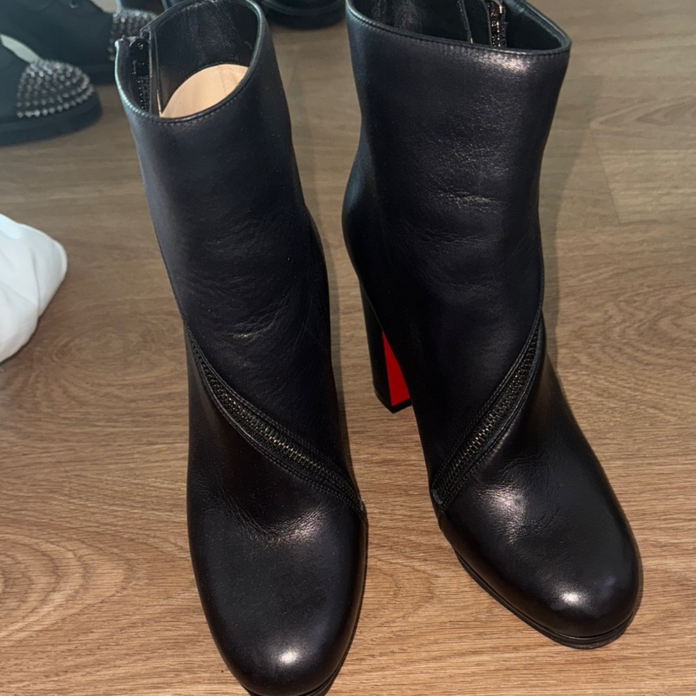 Christian Louboutin Black Heeled Boots with Red Sole